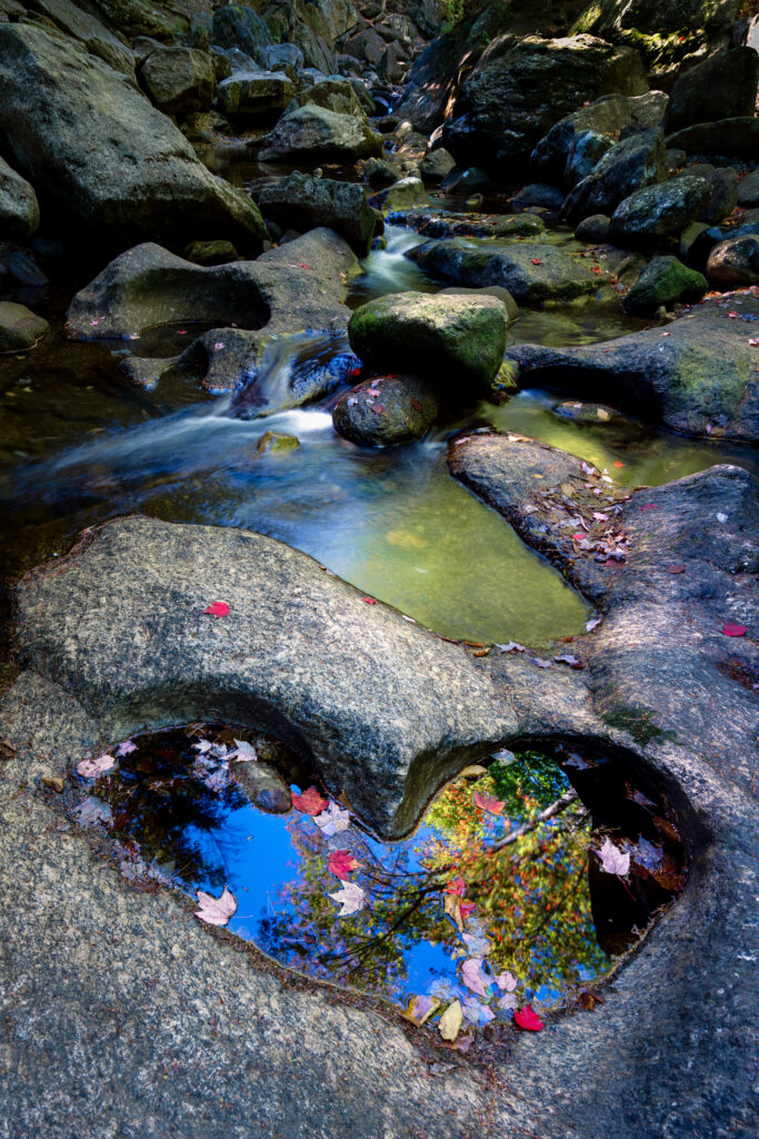 Fine art landscape print by Mike Dooley, trickling water through a dried up river bed in New Hampshire