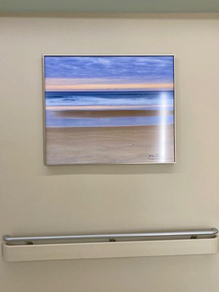 Fine art landscape print by Mike Dooley in a medical office waiting room.