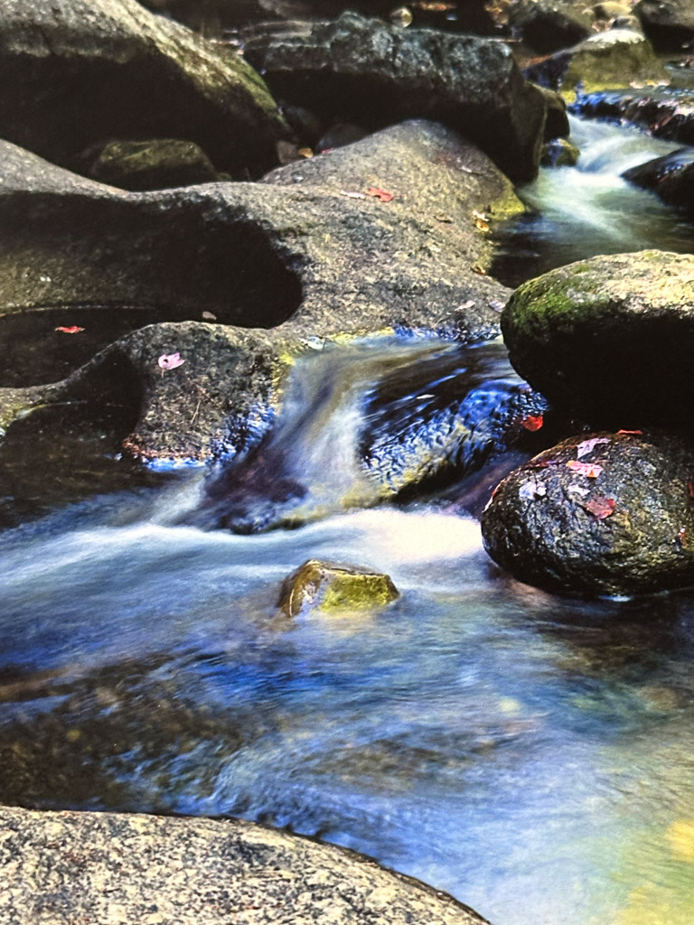 Love on the Rocks 13x19" landscape print on Epson Cold Press Bright paper, displayed on a desk