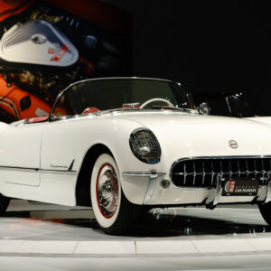 1954 Chevy Corvette convertible with white body and red leather interior at the Newport Car Museum, photographed as a fine art print by Mike Dooley.