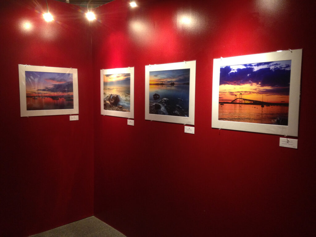 Four 16x20” fine art prints by Mike Dooley Photography hanging in a solo exhibit at Dryden Gallery.