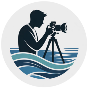 Silhouette of a photographer behind a tripod, surrounded by stylized blue ocean waves