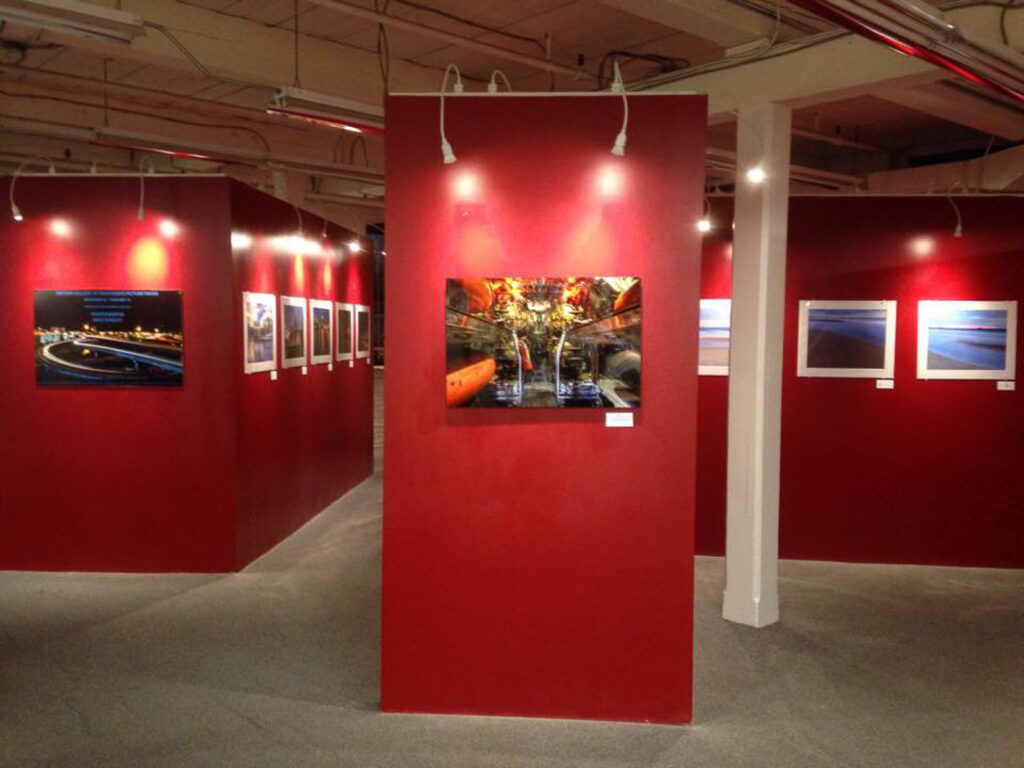 Fine art prints by Mike Dooley displayed in a gallery, professionally curated.