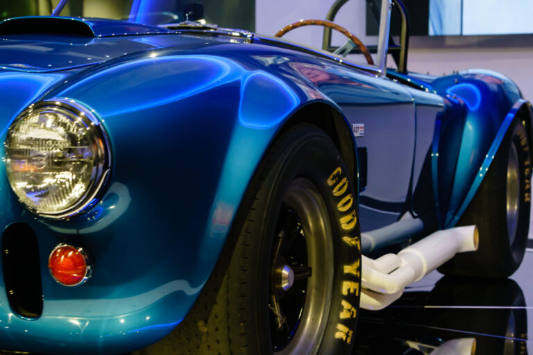 Side view down the body of the Electric Blue Shelby Cobra at the Newport Car Museum