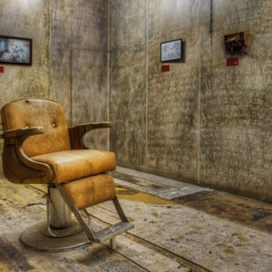 Vintage barber chair inside an old bank vault, photographed as fine art by Mike Dooley.