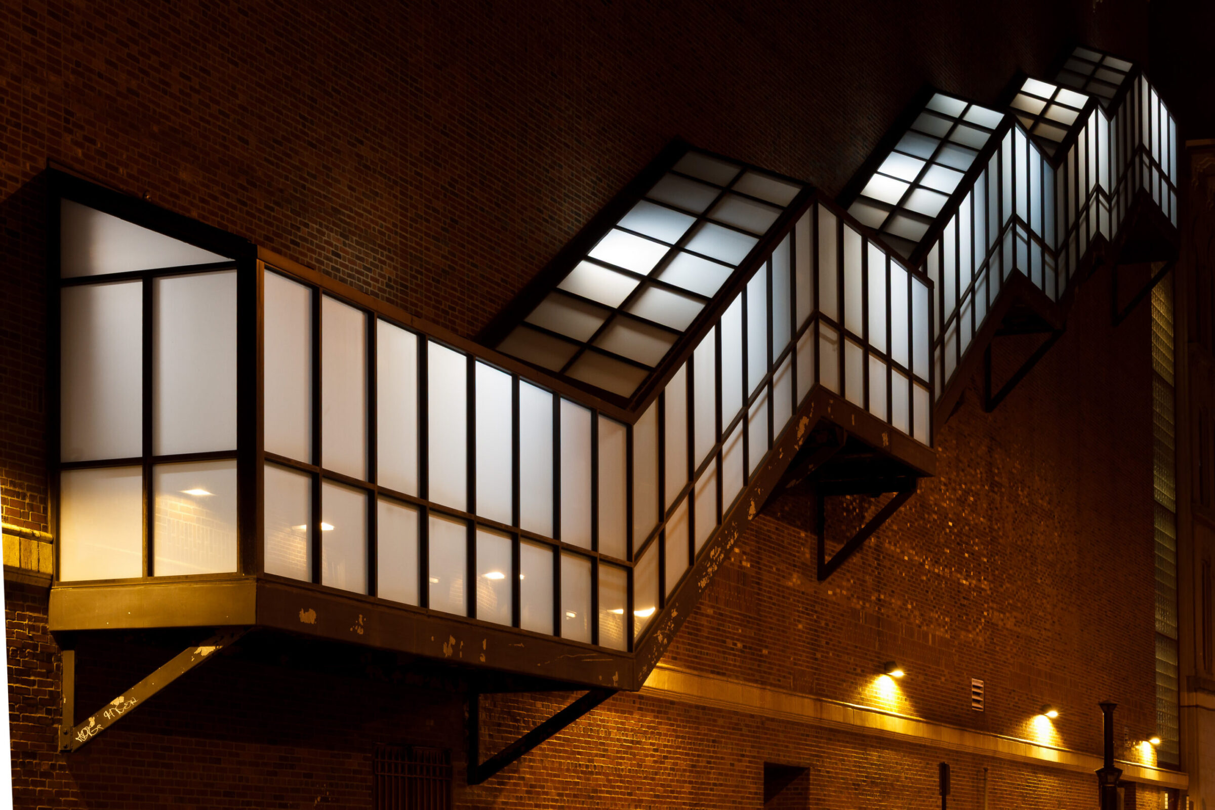 A glowing staircase along the Providence Performing Arts Center at night, Providence, Rhode Island, photographed by Mike Dooley