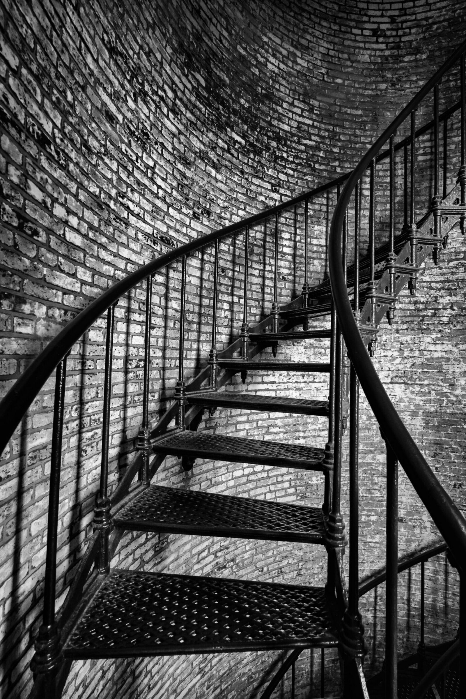 Spiral staircase inside an Outer Banks lighthouse, photographed from above by Mike Dooley
