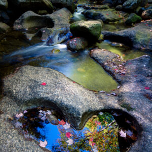 Sunlit rocky coastline, fine art landscape photograph by Mike Dooley