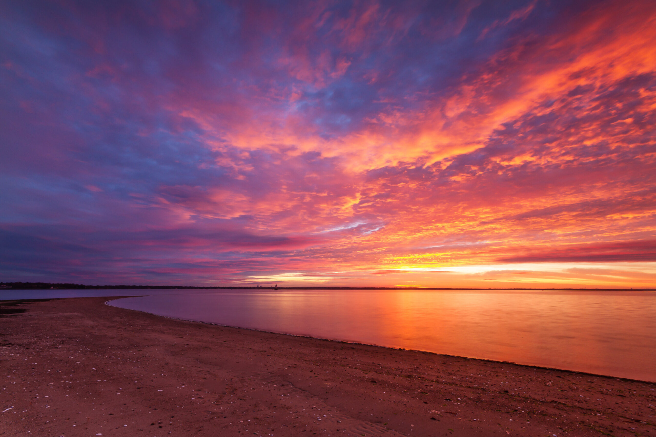 Vivid red sky and sunrise over Conimicut Point in Warwick, Rhode Island - different angle from main sunrise