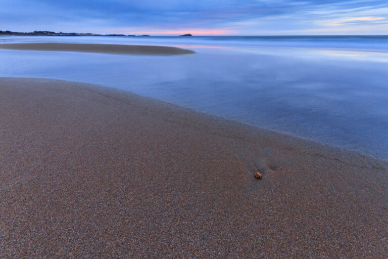 From Coppertone to Quiet: A Winter Sunrise on a Once-Busy Beach