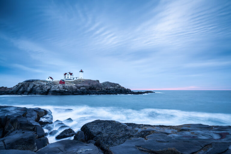 Seascape of Nubble Light lighthouse on a rocky coastline, photographed as a fine art print by Mike Dooley Photography.