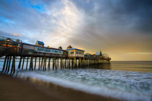 Storm over Old Orchard Pier, dramatic New England seascape, fine art photography by Mike Dooley