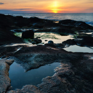 Sunrise over rocky coast, fine art seascape photograph by Mike Dooley