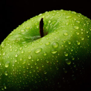 Close-up of a single apple, captured as a fine art photograph by Mike Dooley.