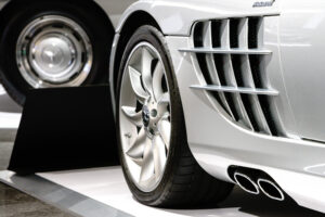 Side detail of a Mercedes showing engine compartment airflow and exhaust at the Newport Car Museum