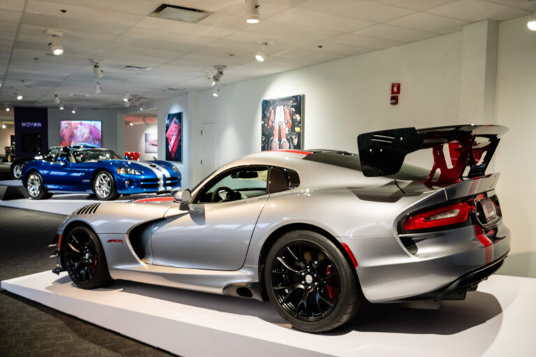 Silver Dodge Viper with red and black racing stripes at the Newport Car Museum