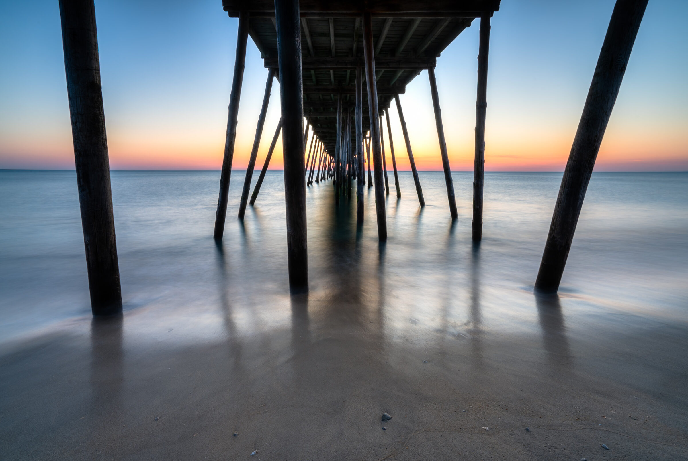 Long exposure of the pilings under Avalon Pier at sunrise, Outer Banks, North Carolina, fine art photograph by Mike Dooley