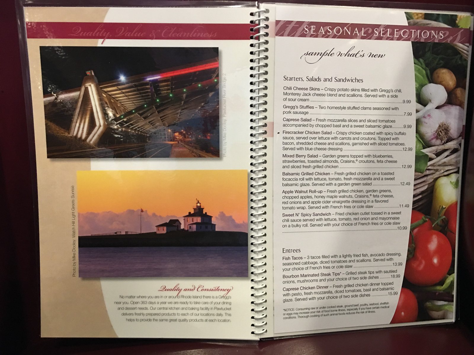 Open restaurant menu showing two Mike Dooley photographs: the Pawtucket River Bridge at night and Watch Hill Lighthouse.