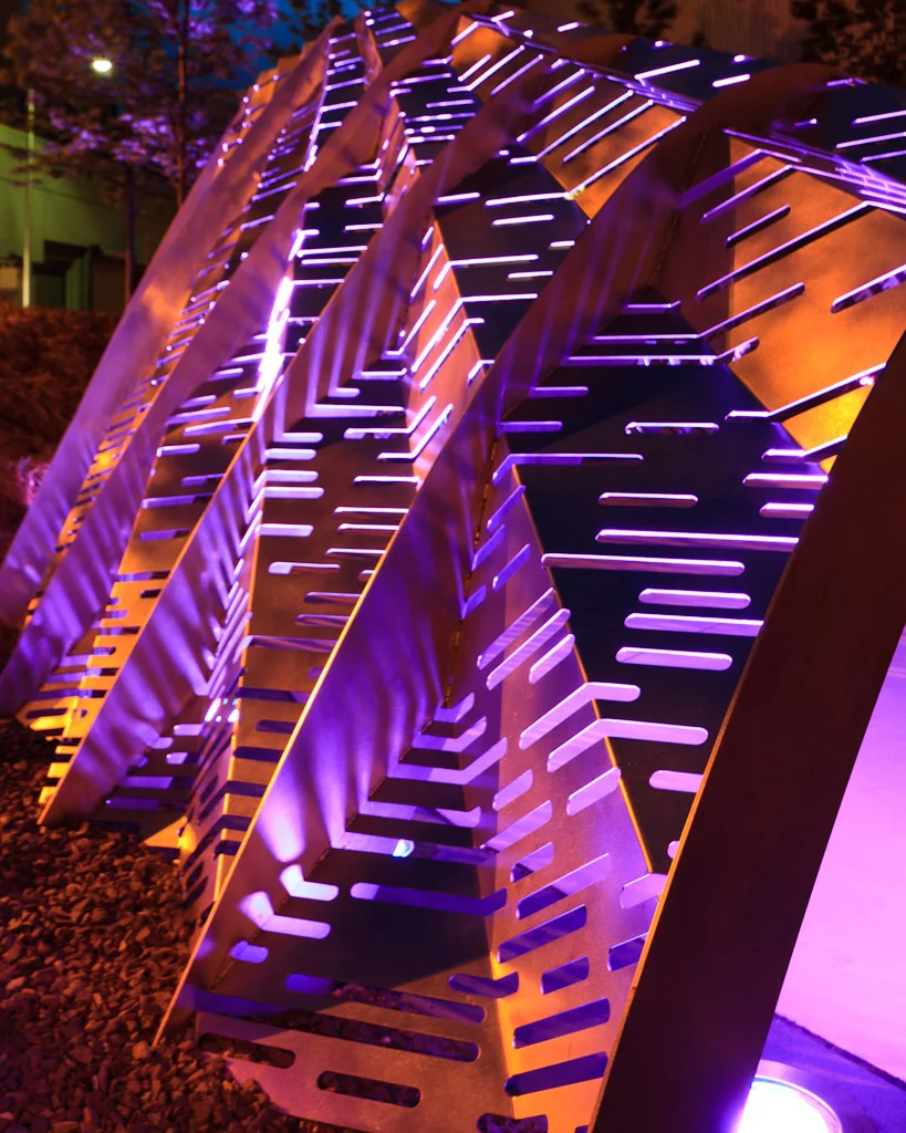 Lit purple sculpture at night in Providence, Rhode Island, fine art photograph by Mike Dooley