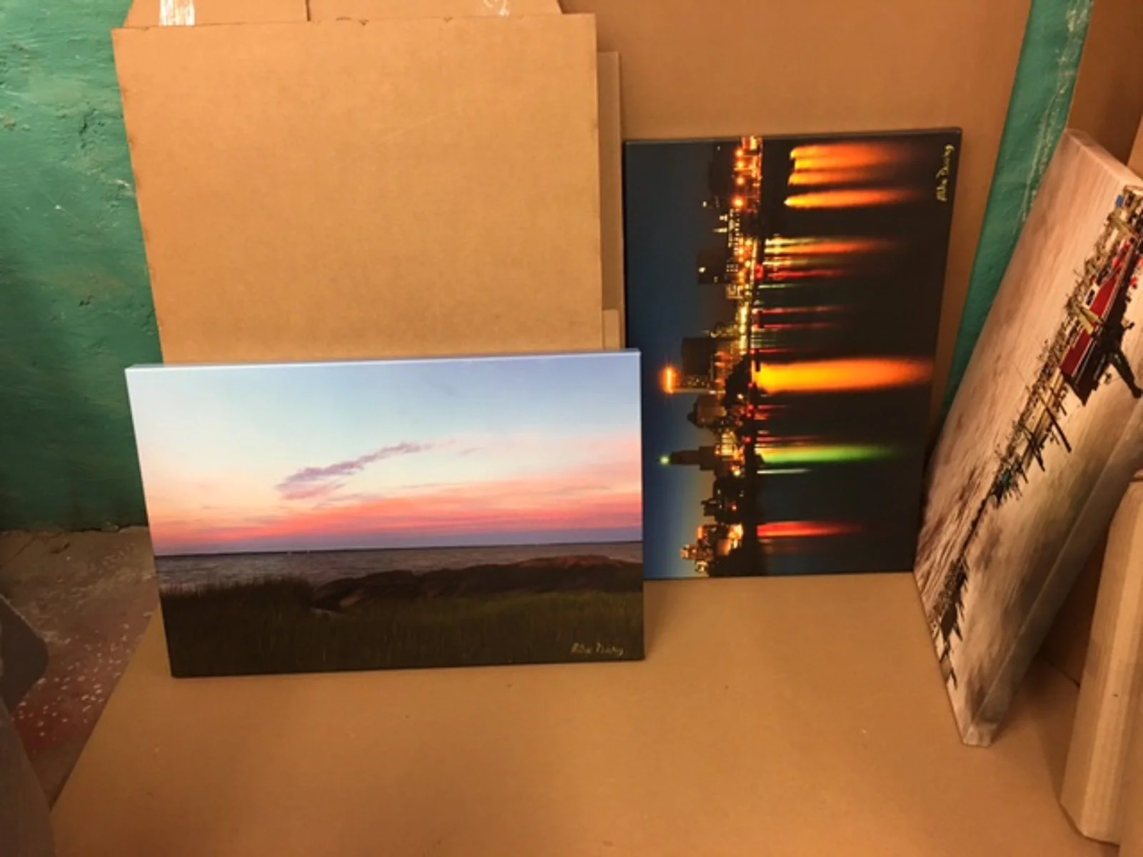 Several signed gallery wrap prints by Mike Dooley packed and ready for delivery to a Rhode Island bank.