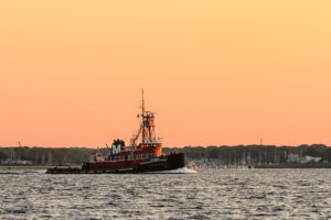 Tugboat Joan Moran at sunrise off Conimicut Point, Rhode Island, fine art photograph by Mike Dooley